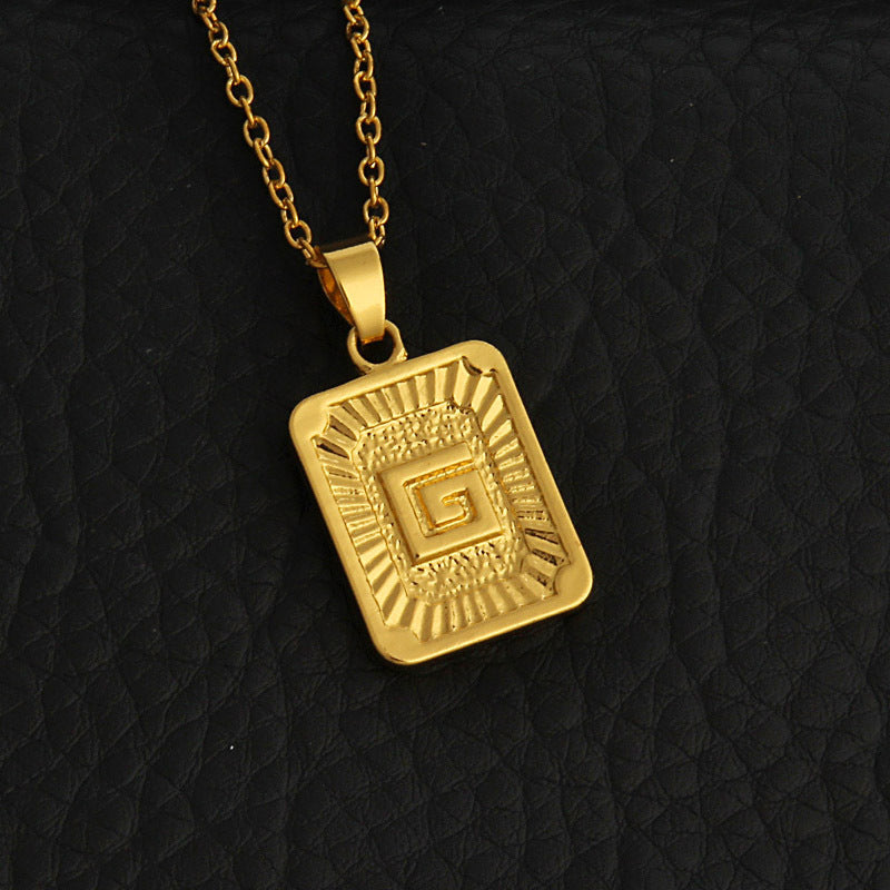 Gold letter necklace
