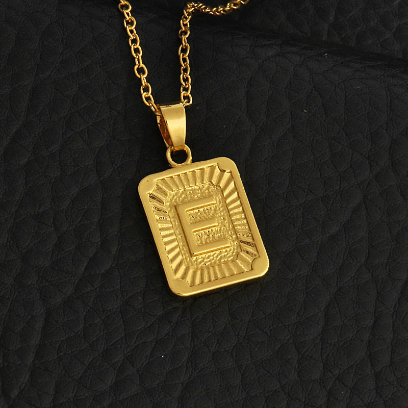 Gold letter necklace