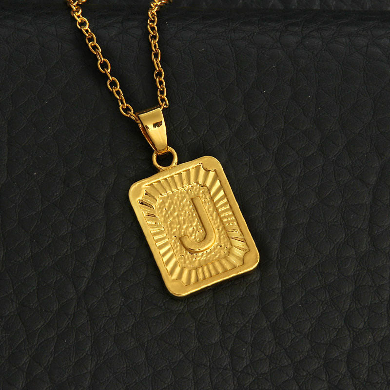 Gold letter necklace