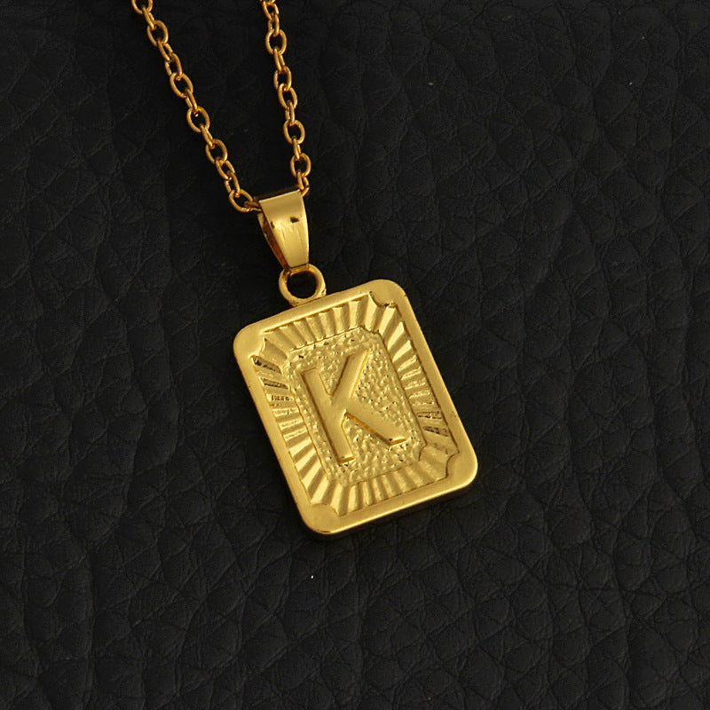 Gold letter necklace