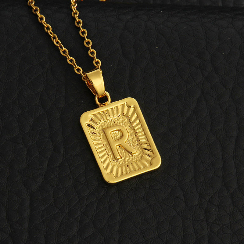 Gold letter necklace