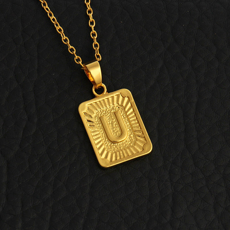 Gold letter necklace