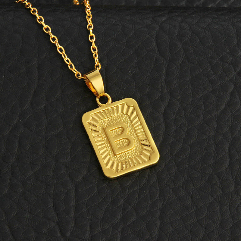 Gold letter necklace