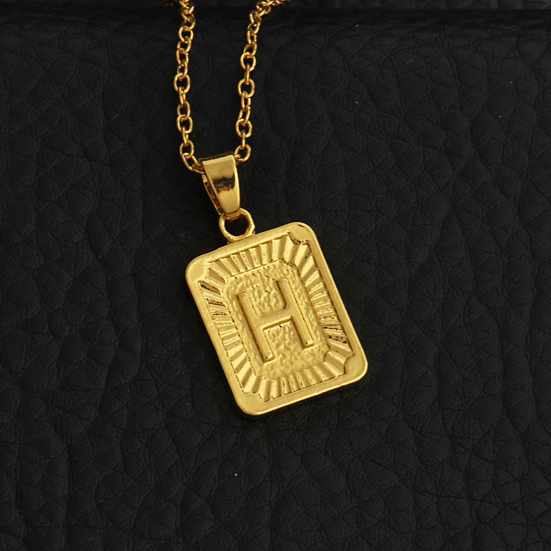 Gold letter necklace