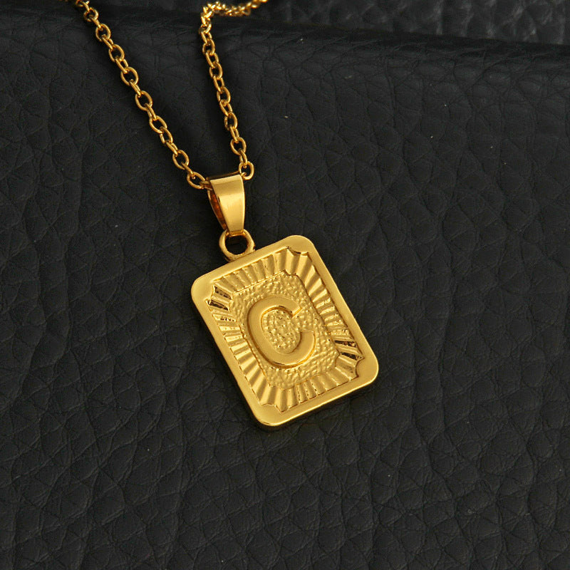 Gold letter necklace