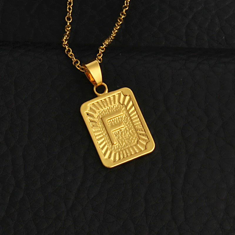 Gold letter necklace
